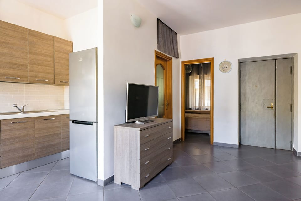 Apartment (1 Bedroom) | Living area | TV