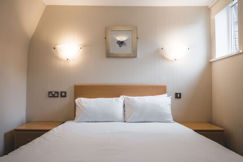 Desk, blackout drapes, iron/ironing board, free WiFi