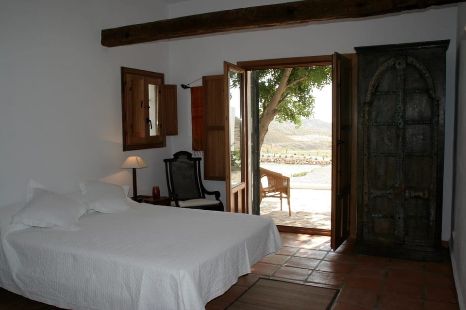Double Room | Minibar, in-room safe, individually decorated, individually furnished