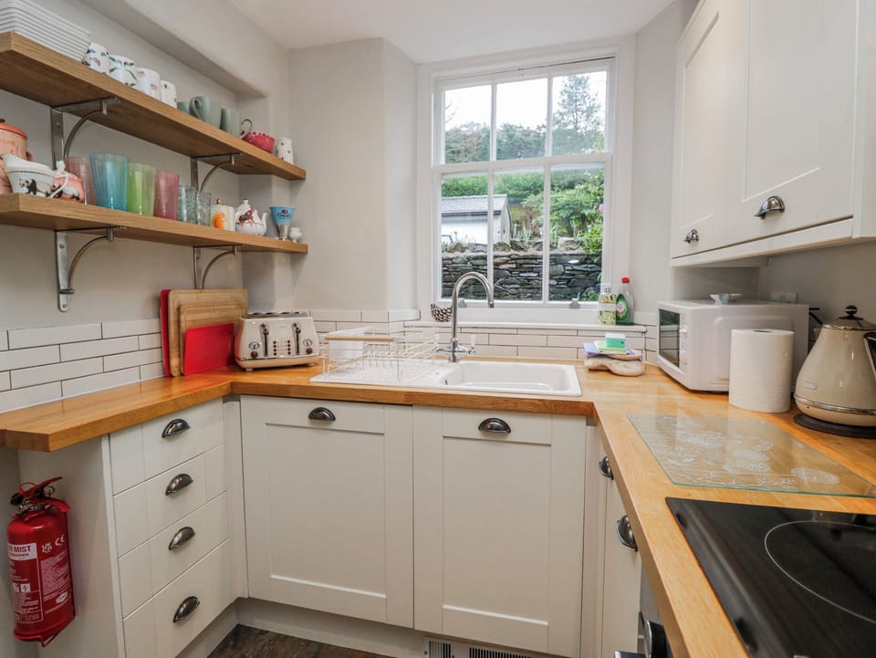 Fridge, microwave, toaster, cookware/dishes/utensils