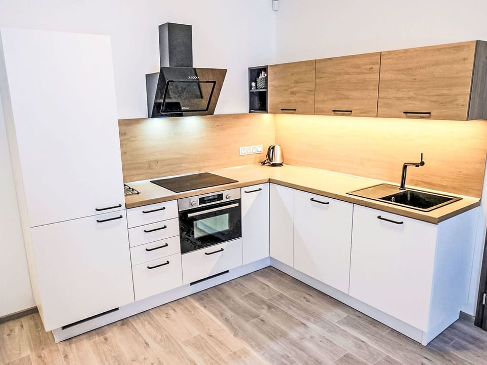 Flooring, Kitchen, Countertop, Kitchen Appliance, Wood, Floor, Interior Design, Cabinetry, Major Appliance, Furniture