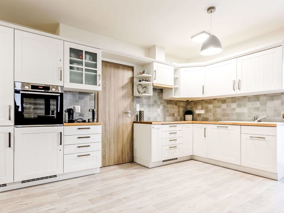 Cabinetry, Kitchen, Countertop, Furniture, Flooring, Wood, Interior Design, Major Appliance, Kitchen Appliance, Cupboard
