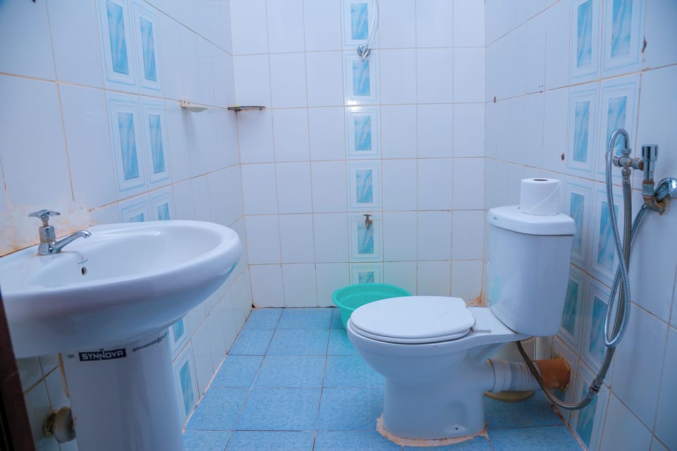 Shower, free toiletries, slippers, towels