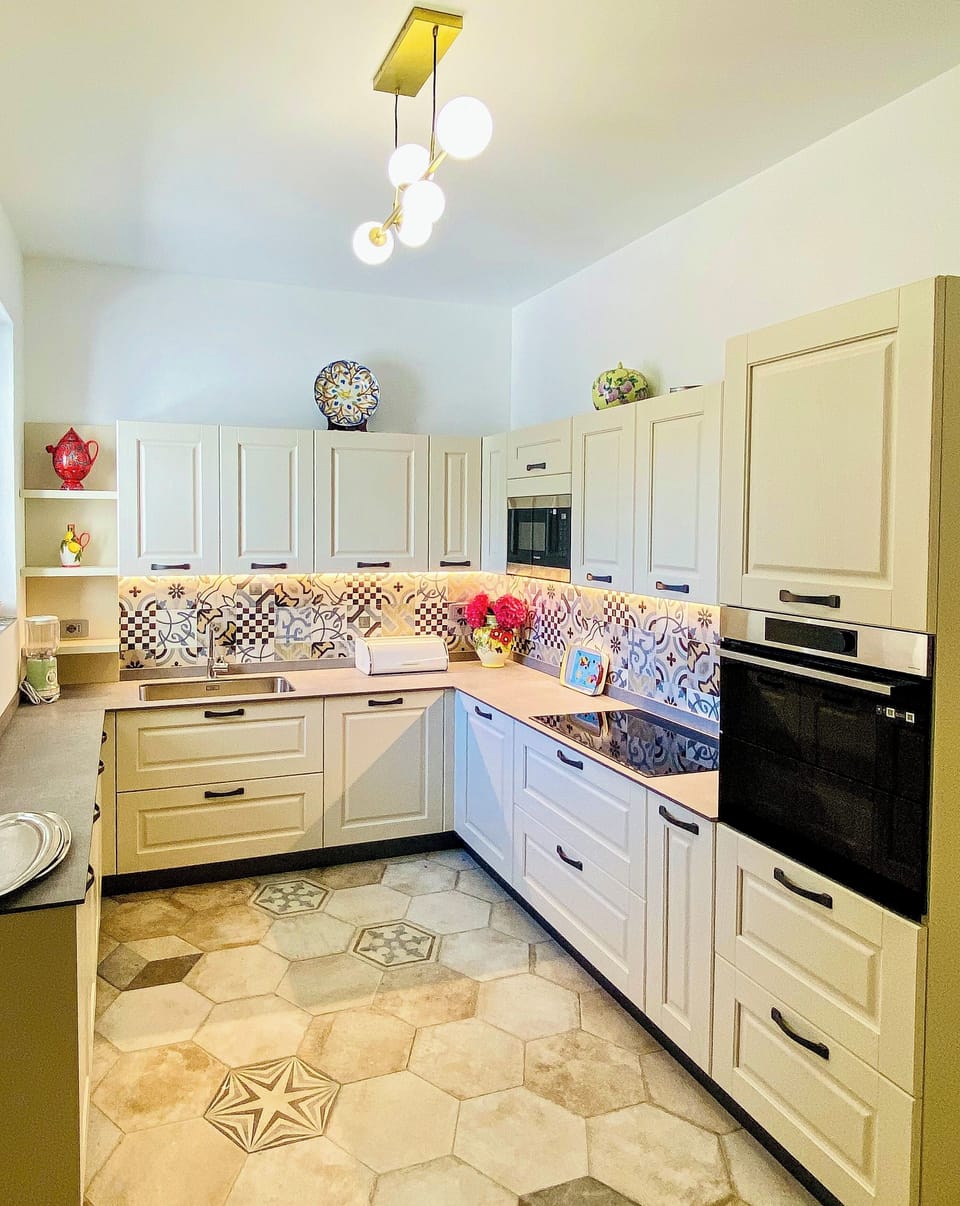 Fully equipped kitchen with oven, microwave, dish washer, induction stove, etc.