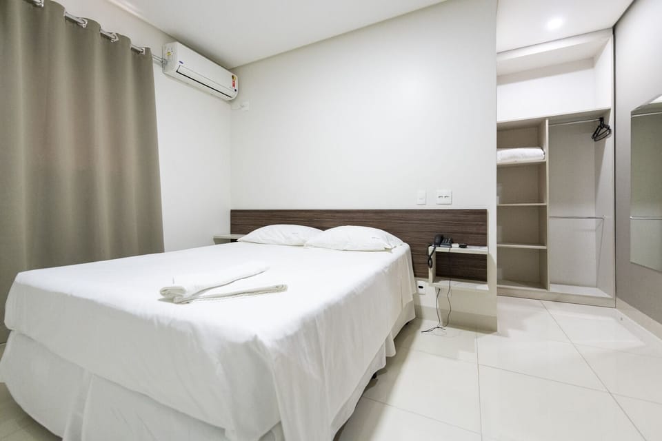 Double Room | Minibar, in-room safe, desk, blackout drapes