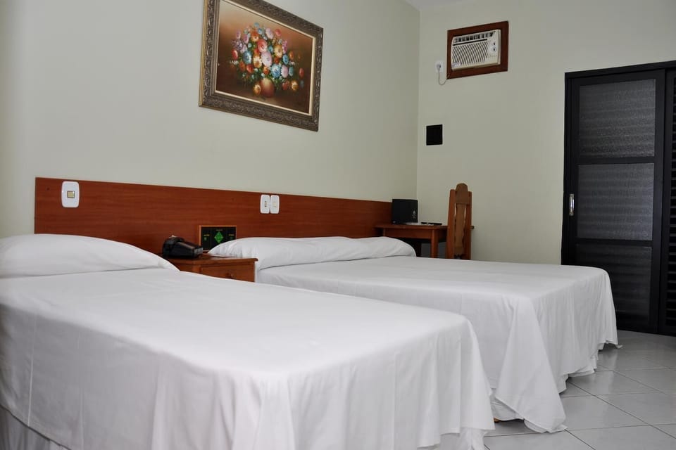 Standard Quadruple Room | 1 bedroom, minibar, desk, blackout drapes
