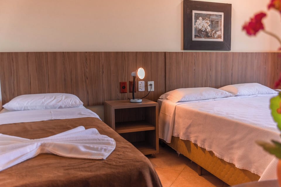 Standard Room | Minibar, in-room safe, desk, iron/ironing board