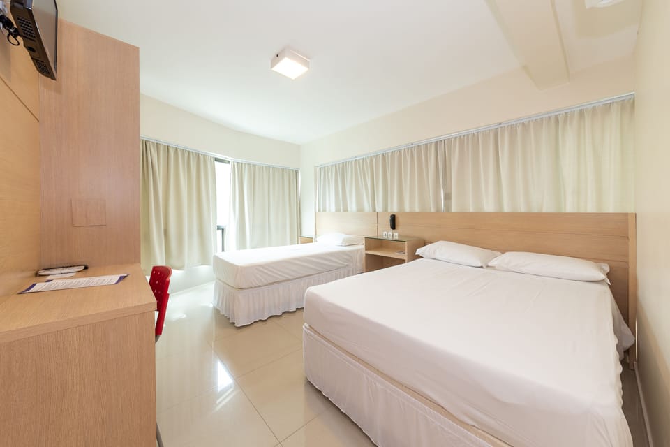 Family Apartment | Minibar, desk, blackout drapes, iron/ironing board