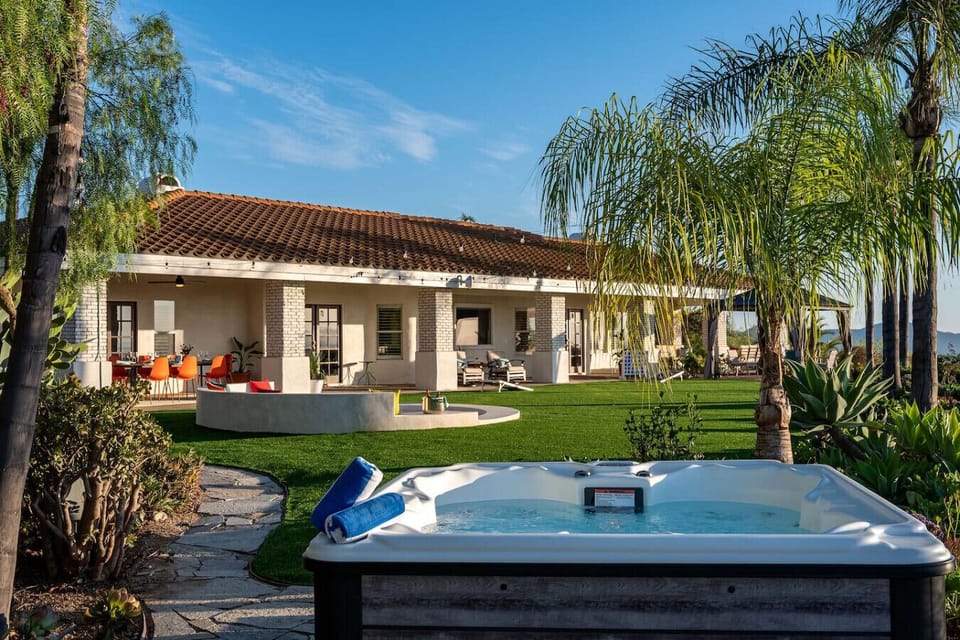 Relax in the hot tub while taking in breathtaking panoramic views of the surrounding vineyards and rolling hills.