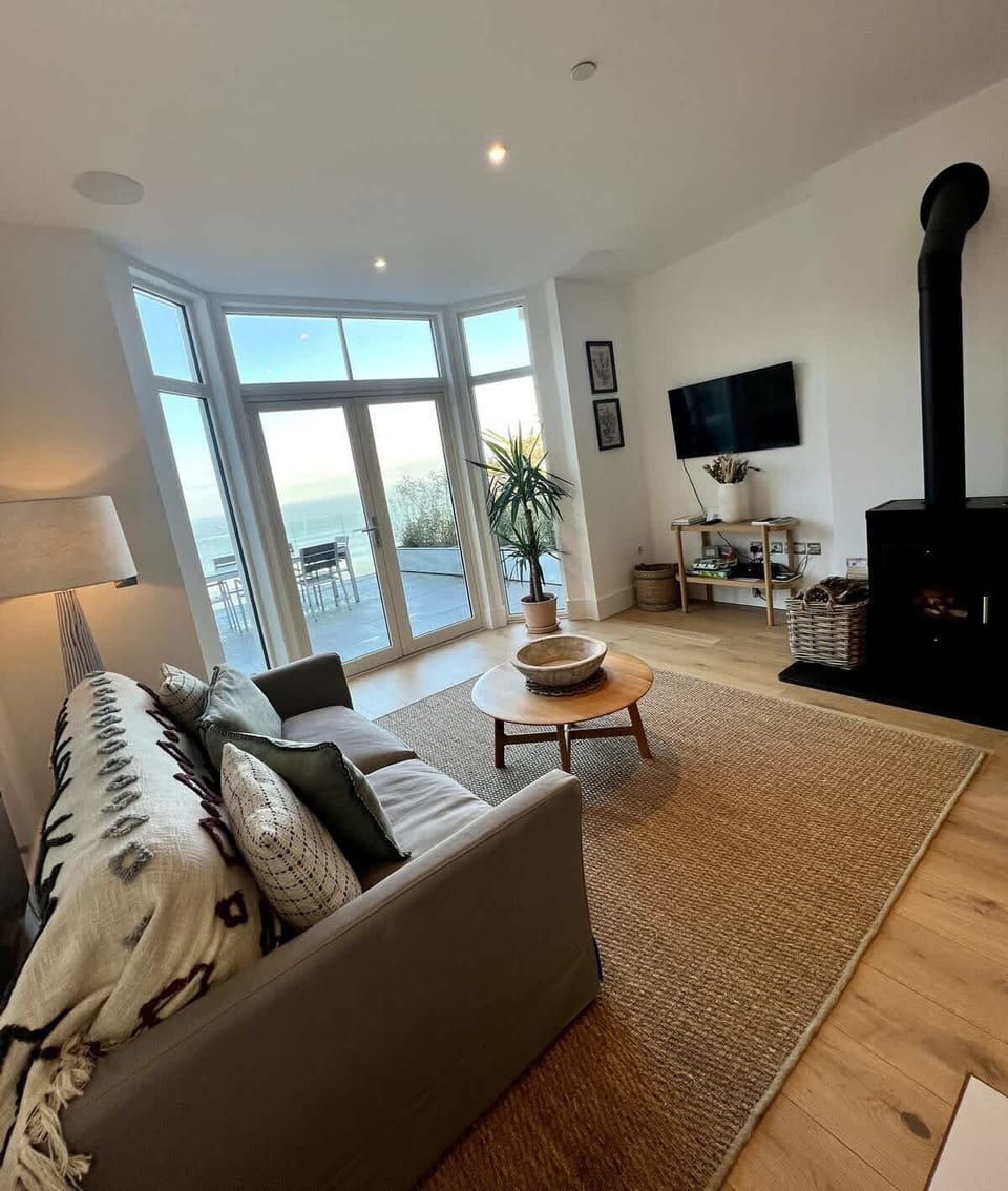 Unwind in the roomy living area that flows seamlessly out onto the balcony, offering the perfect location for taking in the breathtaking views and the fresh air.