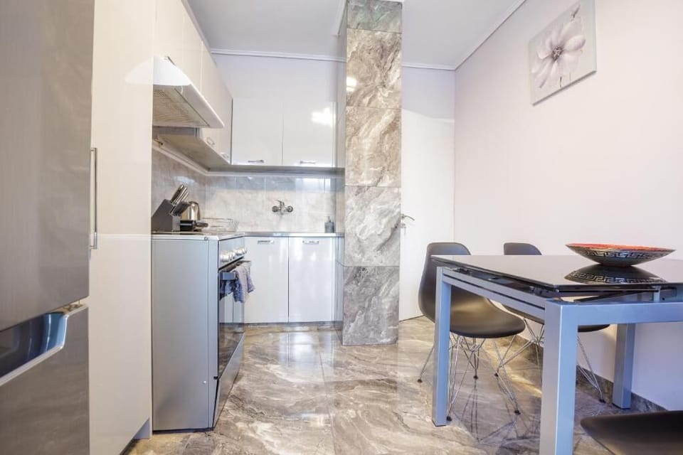 Modern kitchen and dining area with vibrant accents