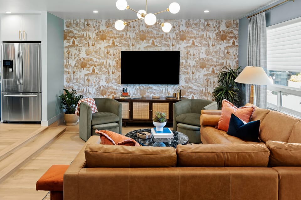 Living room offers a 65" SmartTV just off the kitchen.