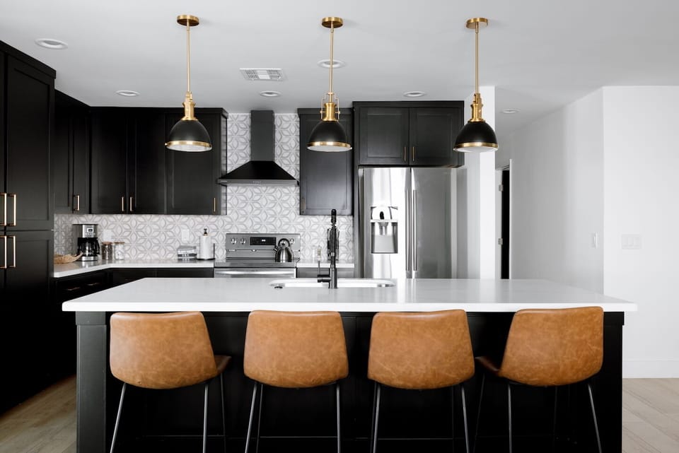 The kitchen comes with a large island with seating for 4.