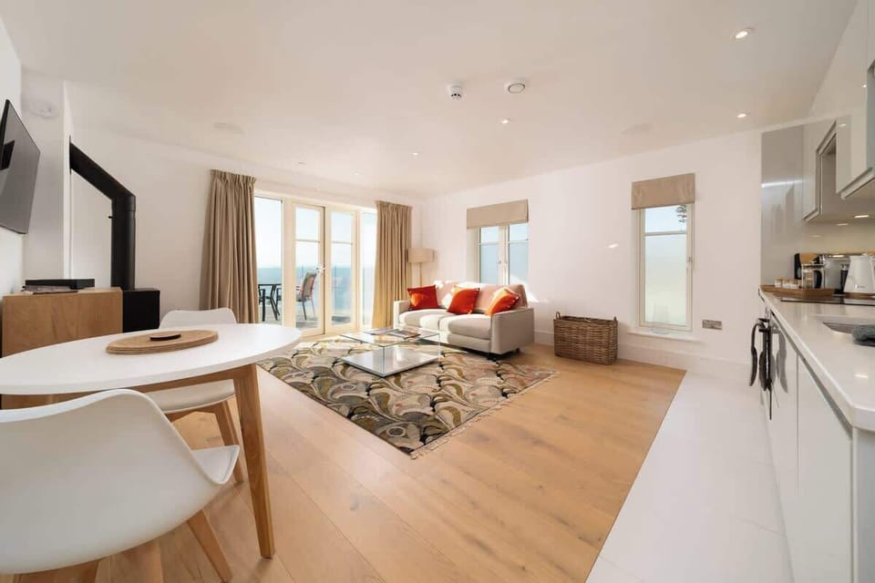 Enjoy a bright and spacious open-plan living area that flows seamlessly onto the balcony — perfect for relaxing or entertaining with a view.