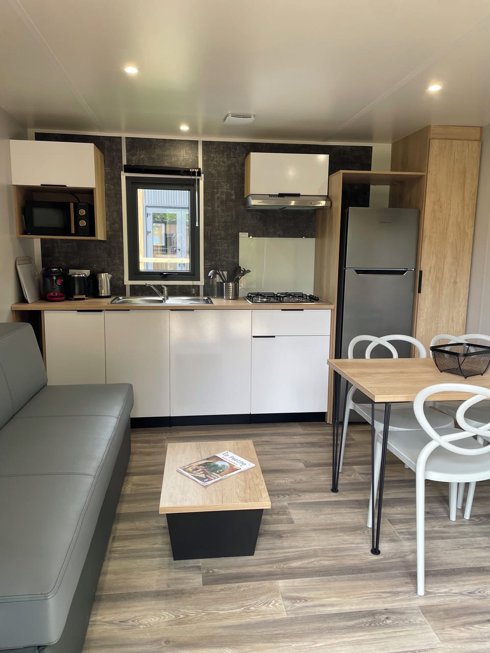 Quadruple Room, Park View | Living area | TV