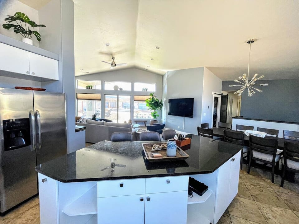 Prepare meals together in our fully-stocked spacious kitchen