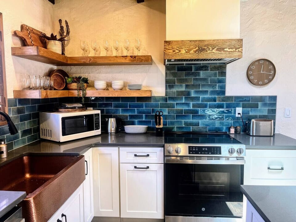 Cook meals together in the remodeled, fully equipped and stocked kitchen
