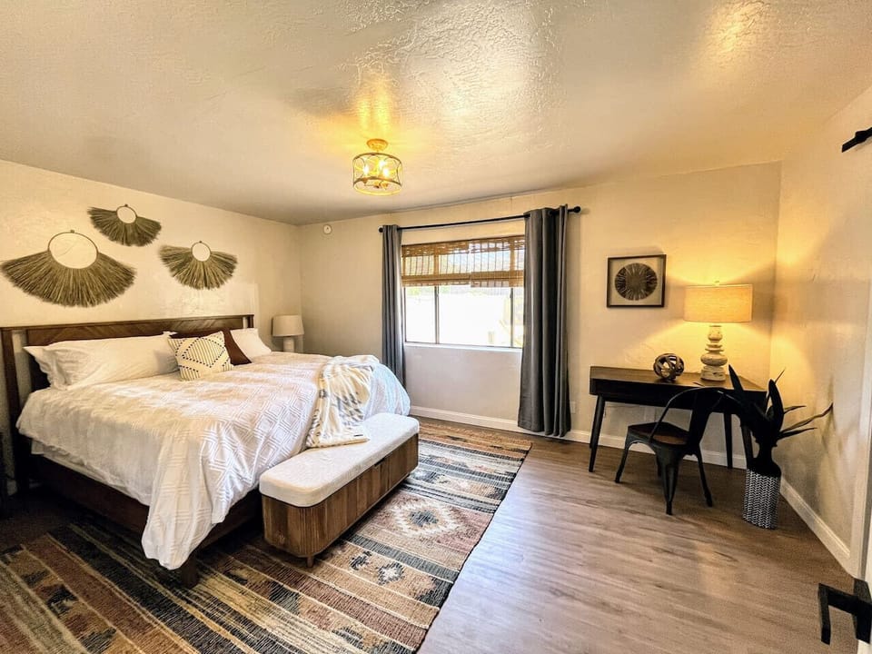Relax in Horseshoe Suite #2 with king-size bed, large closet, desk space, and ensuite Full Bathroom #2