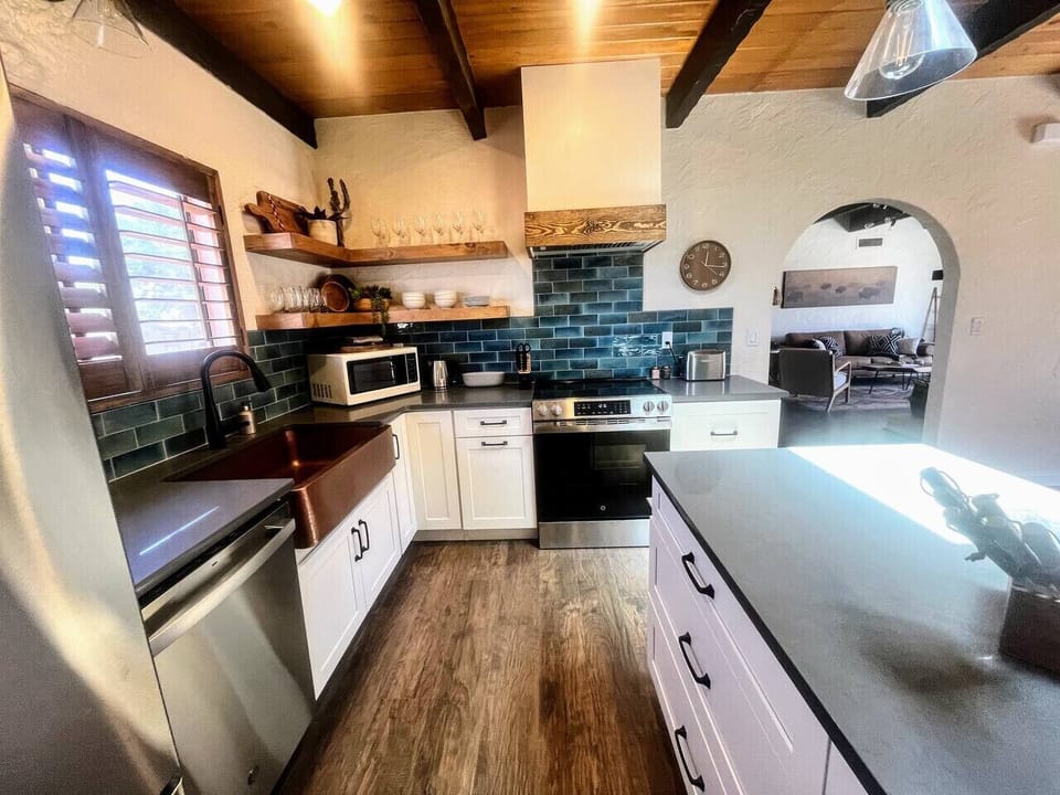 Cook meals together in the remodeled, fully equipped and stocked kitchen