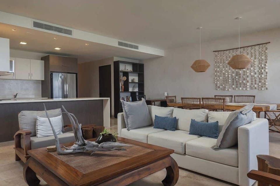 A spacious living room offering stunning ocean views and the soothing breeze of the sea.