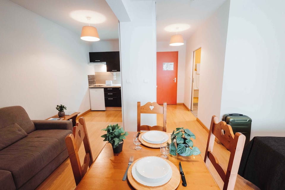 Welcoming layout with air-conditioned comfort and a cozy dining space for six.