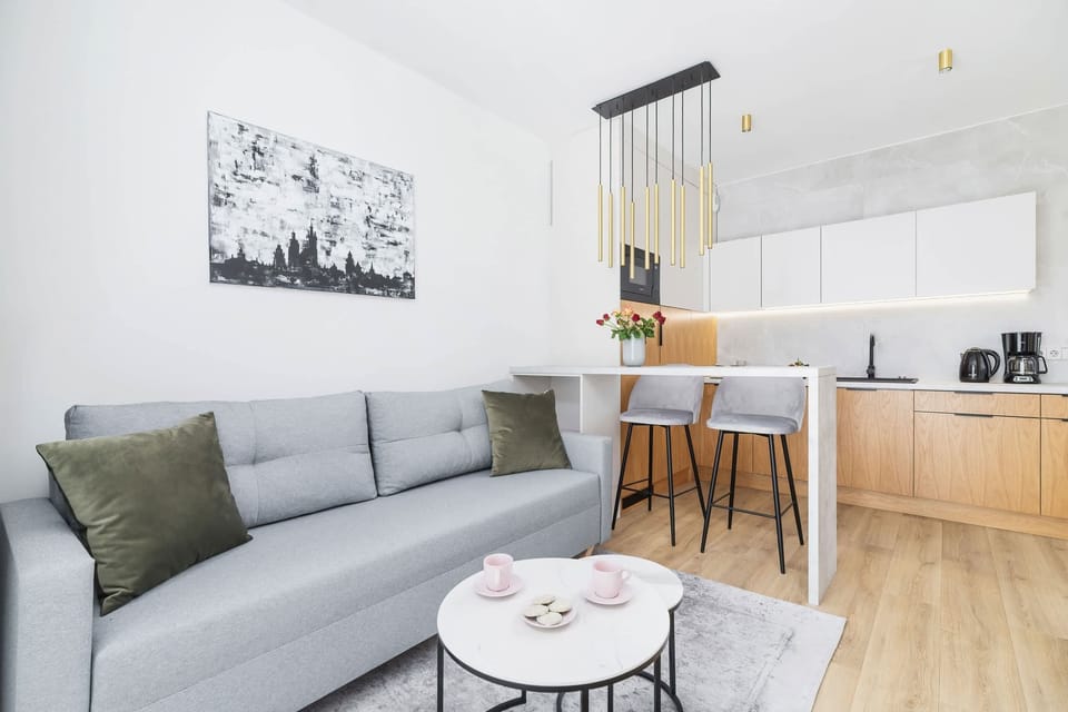 Living room with a comfortable sofa and TV. 