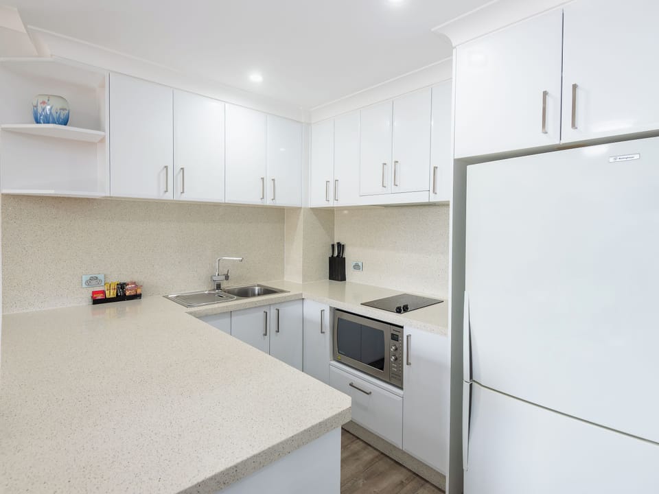 Two Bedroom Lakeview Apartment | Private kitchen | Coffee/tea maker, fridge