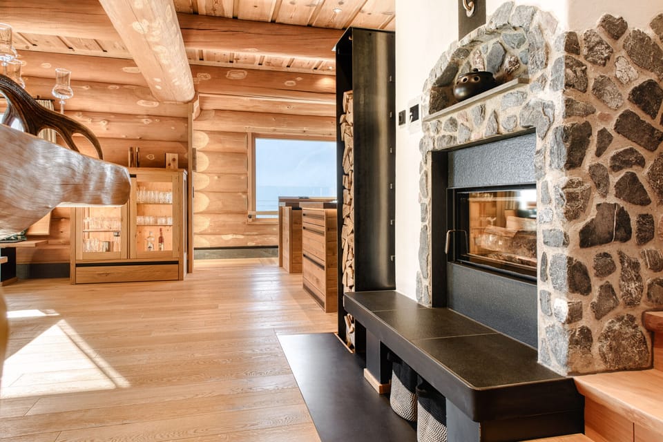 Chalet Bomhüsle in Dalaas in the Klostertal valley with a fireplace.