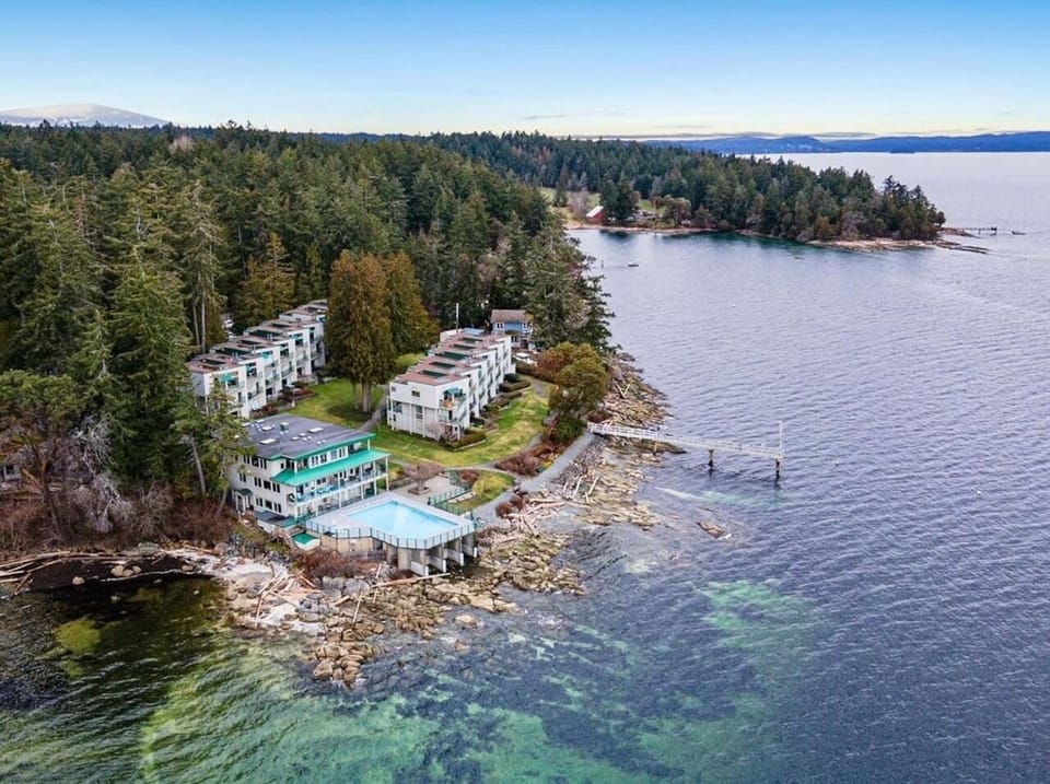 Beautiful Inn of The Sea Resort & it's surroundings viewed from above. All units at Inn of The Sea Resort are privately owned and operated and share the pool area, dock and grounds. 