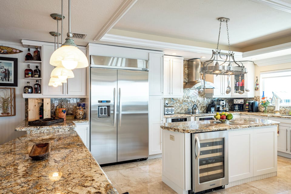 Double-door fridge and wine cooler make this kitchen perfect for longer stays.