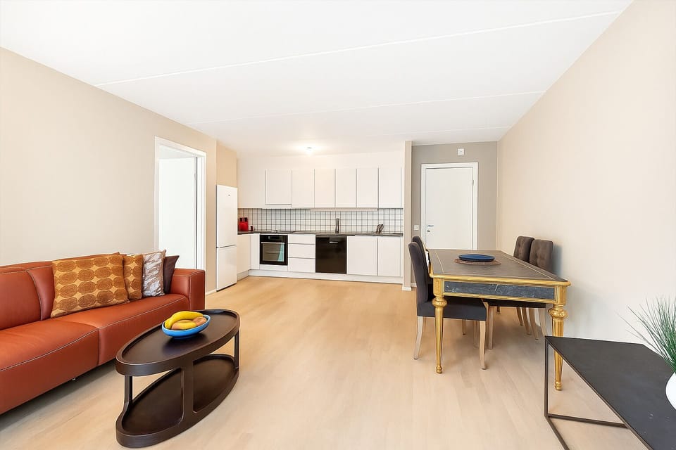 Spacious living area with luxury sofa—perfect for relaxing after a day out.