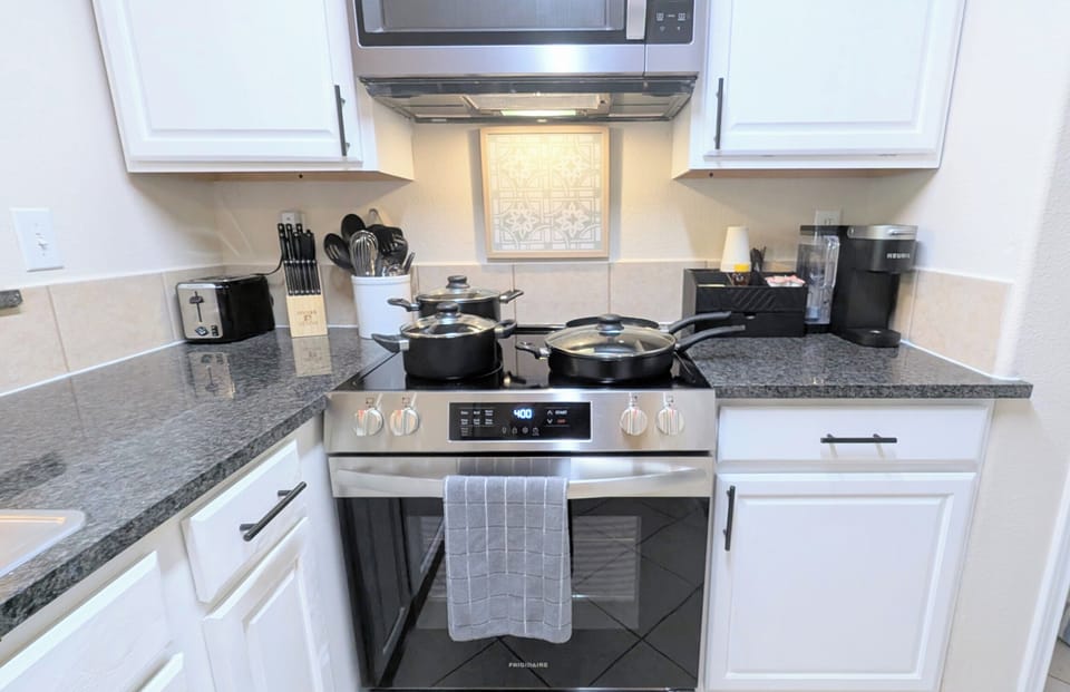 Cooking is a breeze with a complete set of cookware, utensils, and knives. 