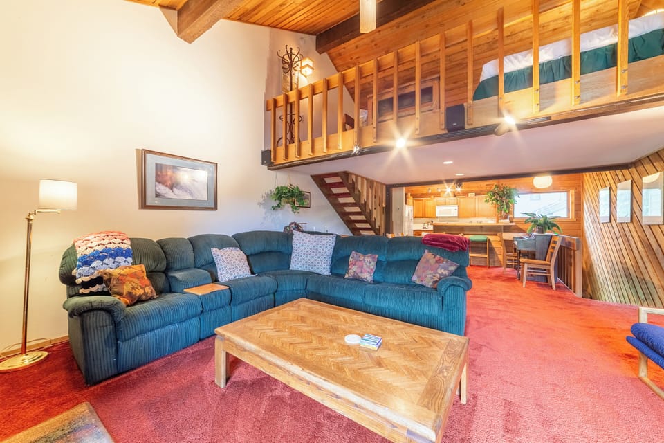 Living room is open to dining room and kitchen area.