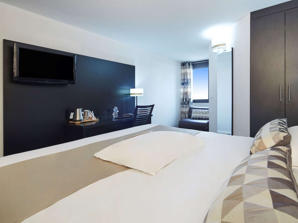 Blackout drapes, soundproofing, iron/ironing board