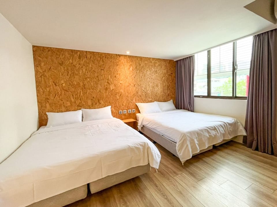 Four-Person Suite | Down comforters, blackout drapes, iron/ironing board, free WiFi
