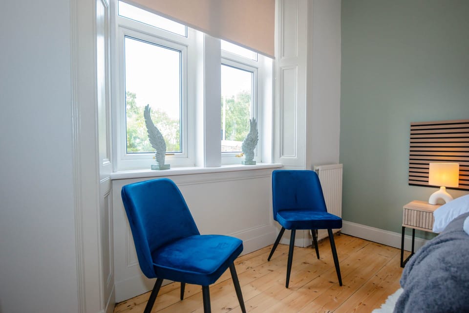 Comfortable seating area in the main bedroom