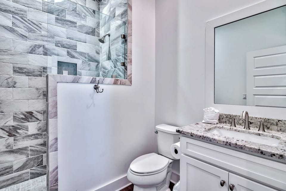 2nd Floor - King suite with private covered balcony and an ensuite bathroom