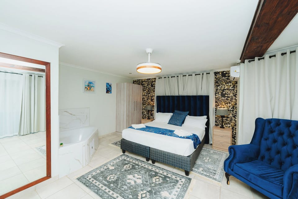 Luxury Room, Private Bathroom, Courtyard View | Individually decorated, individually furnished, desk, laptop workspace