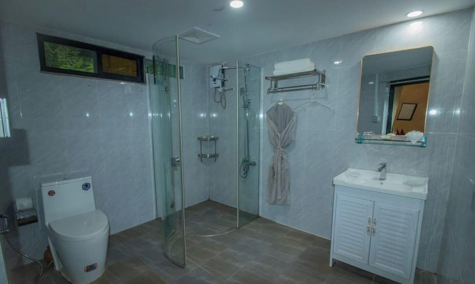 Shower, slippers, towels, soap