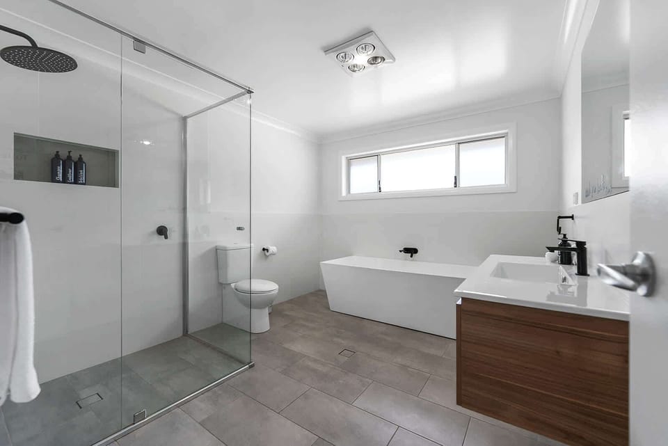 Bathroom 2 (Main) - Shower, Bath, Toilet + Hair Dryer