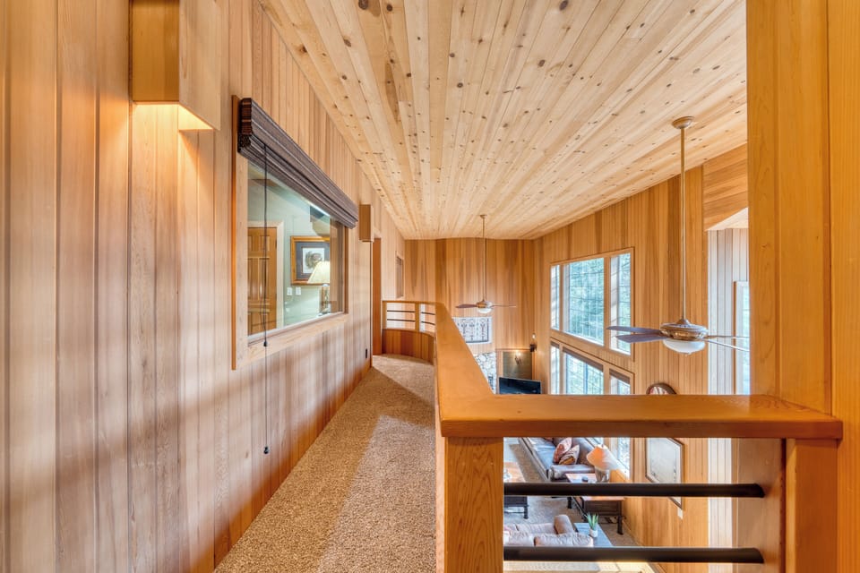 Upstairs hallway with natural wood finish