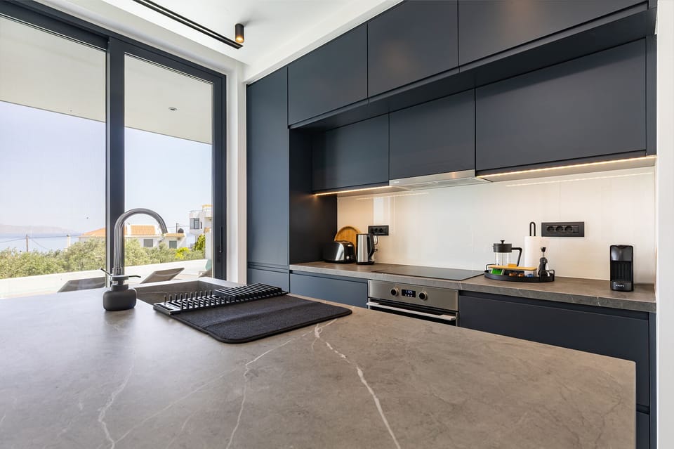 Luxury Villa, Sea View, Beachfront | Private kitchen | Electric kettle