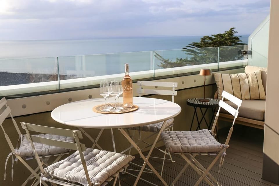 Enjoy the views from the private outdoor balcony, the perfect place to sip wine in the sun!