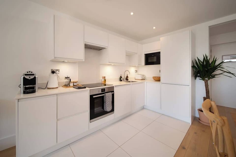 The spacious kitchen comes fully equipped with everything you need.