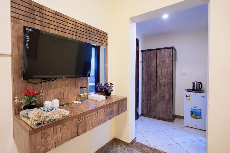 Quadruple Room | Minibar, soundproofing, iron/ironing board (on request), WiFi (free)