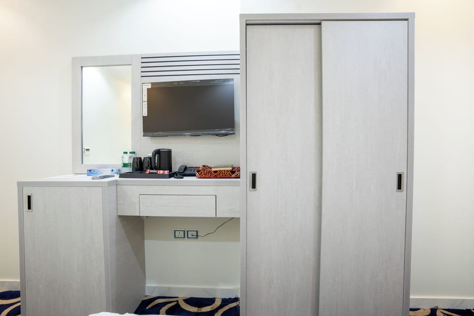 Suite (Two Rooms) | Minibar, blackout drapes, soundproofing, iron/ironing board (on request)