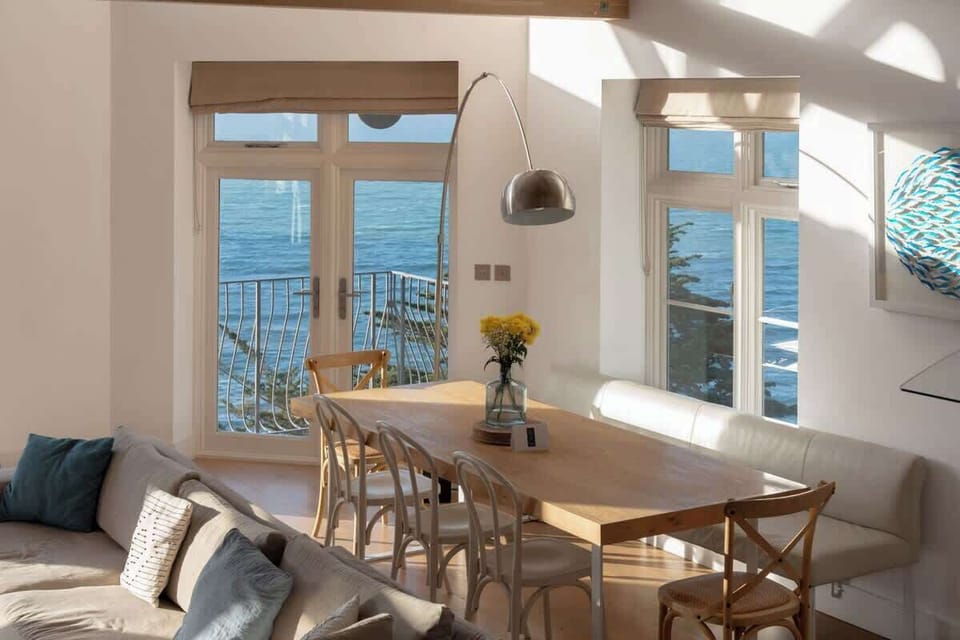 Dine in style with panoramic views from your apartment's dining area, where the beauty outside your window complements each meal. 