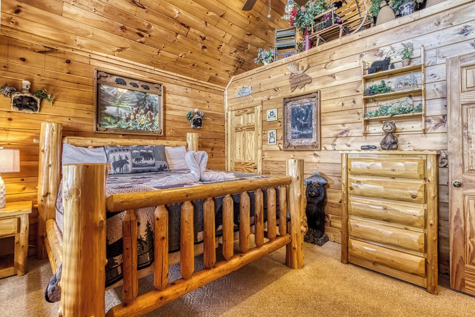Wears Valley Cabin with an Indoor Pool "Wet and Wild" - Bedroom with king size log bed