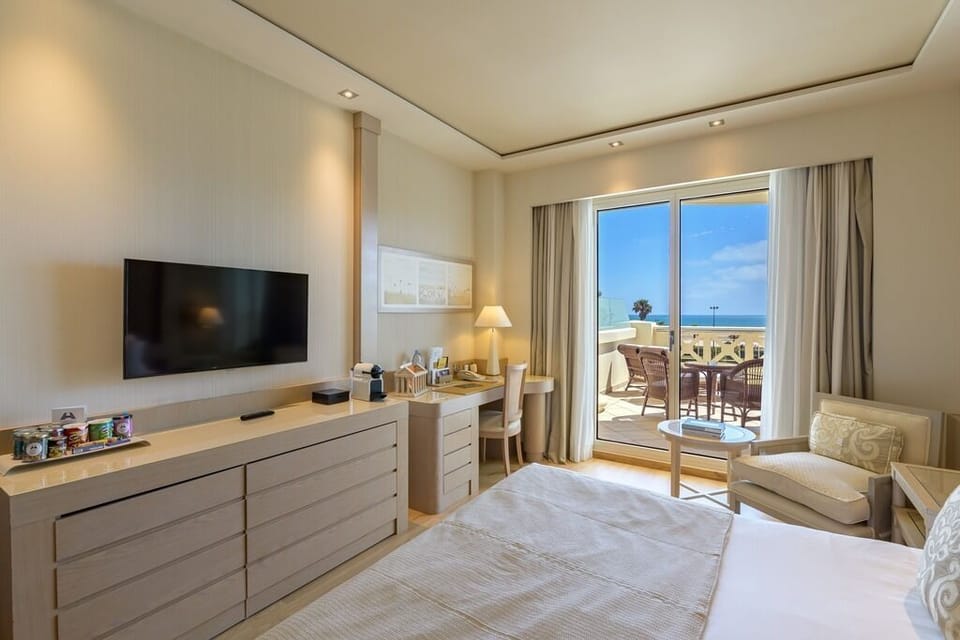 Deluxe Room, Terrace, Sea View | Premium bedding, minibar, in-room safe, desk