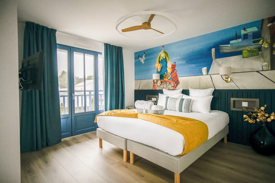 Deluxe Quadruple Room, Balcony, Ocean View | Minibar, in-room safe, blackout drapes, soundproofing